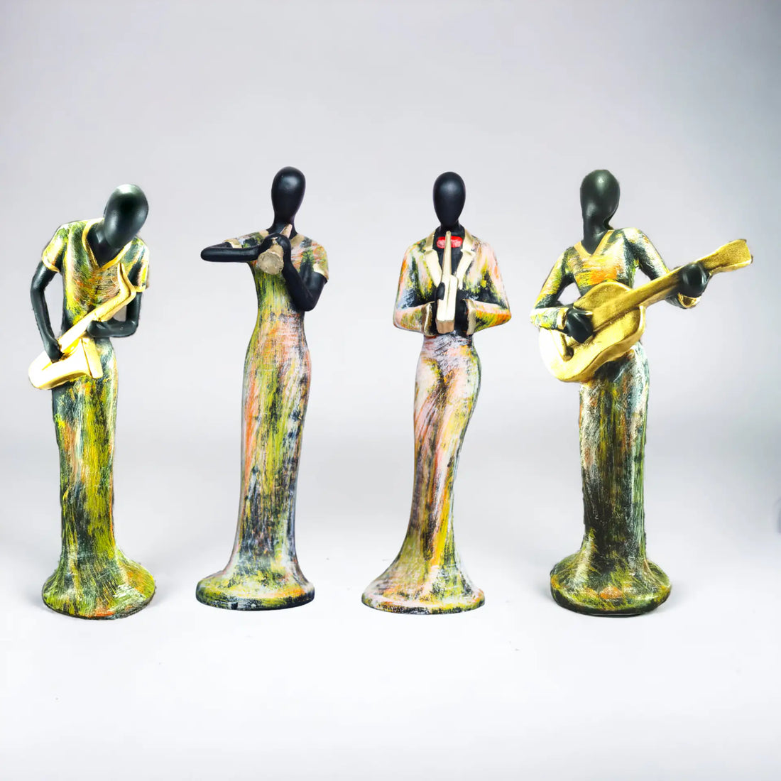 Multicolour Set Of 4 ladies playing instruments Statue In Polyresin