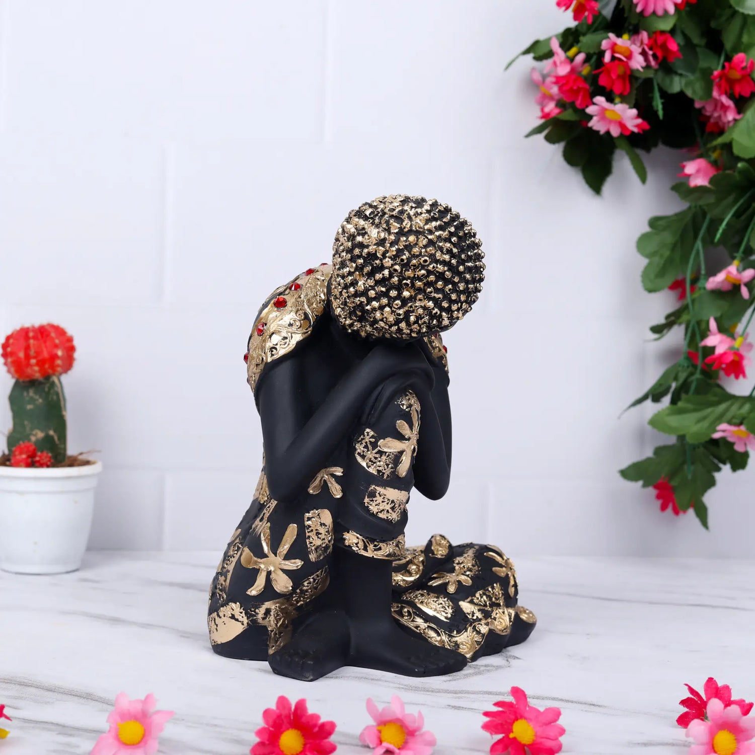 Pleasing Resting Buddha on Knee Polyresin Decorative Showpiece