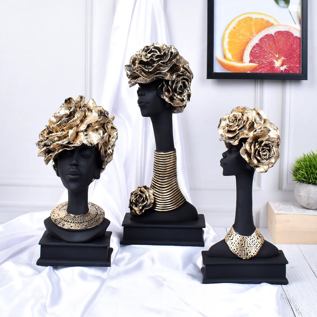 Three african Ladies Wearing Necklaces:Adorned Beauty