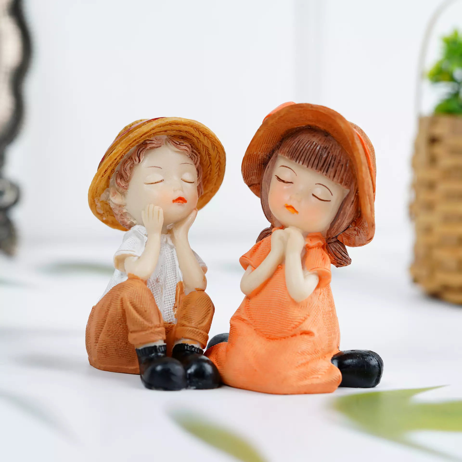 Two Kids Sitting Resin Statue