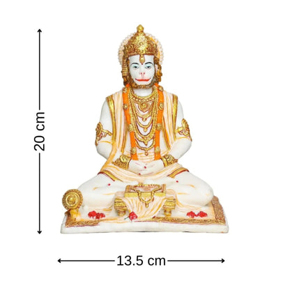 Aurance Lord Hanuman sitting statue in meditative pose with gada and book, featuring intricate gold and white details.