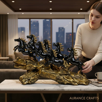 Aurance Running Horses tabletop sculpture with polished black horses on a textured antique gold base in a modern home.