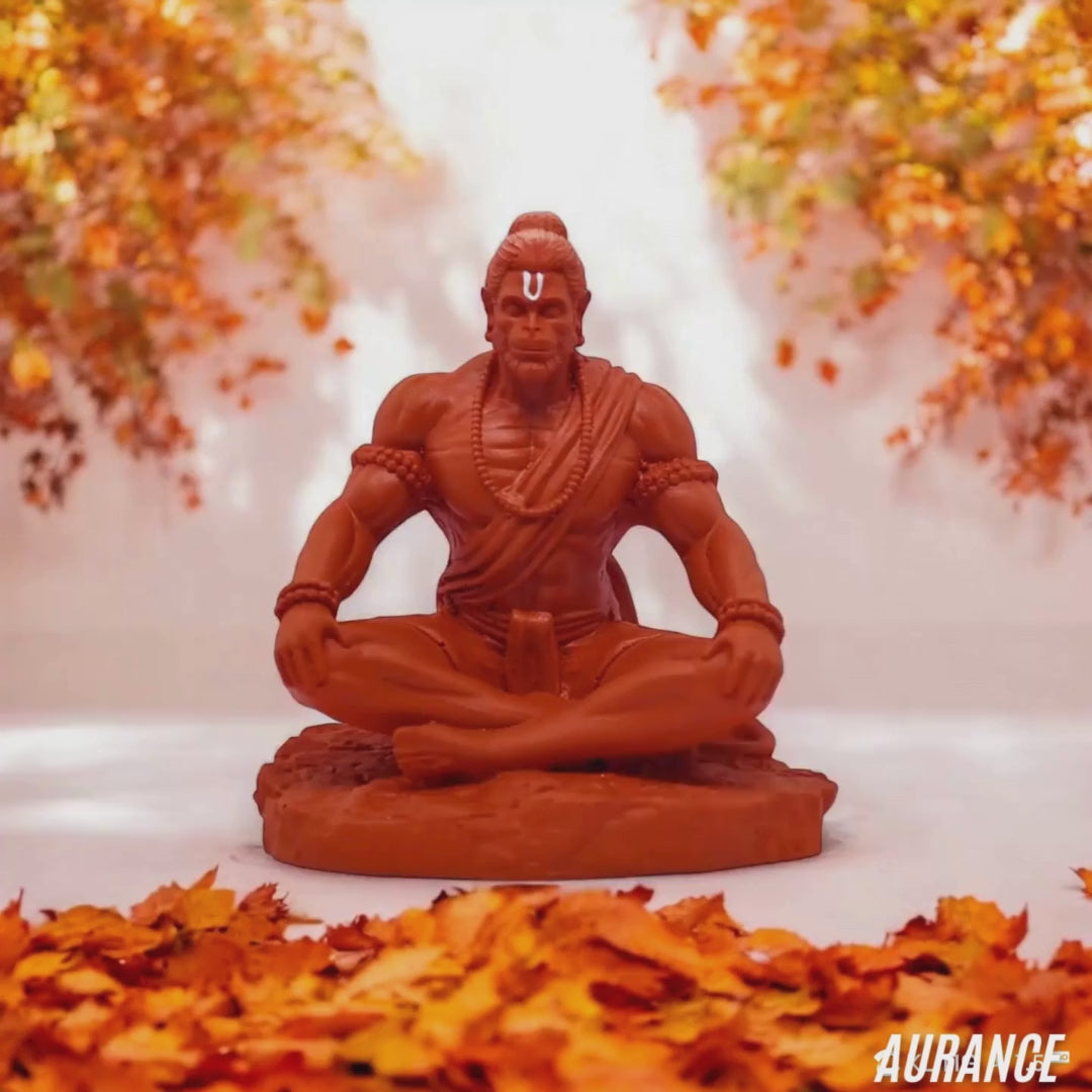 Orange Hanuman Statue in Meditating Pose